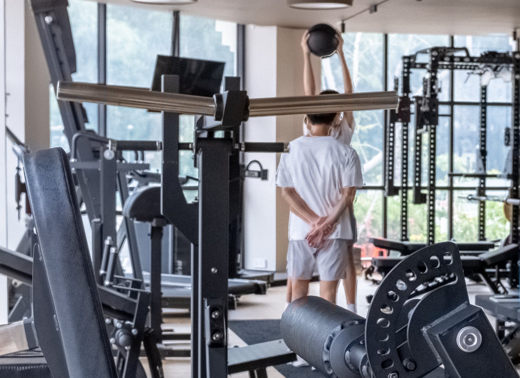 Athlete training on the weights floor